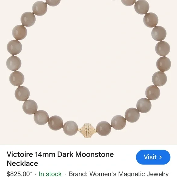 Saks fifth Avenue moon stone hand strung. New in duster. 14k gold plated clasp
